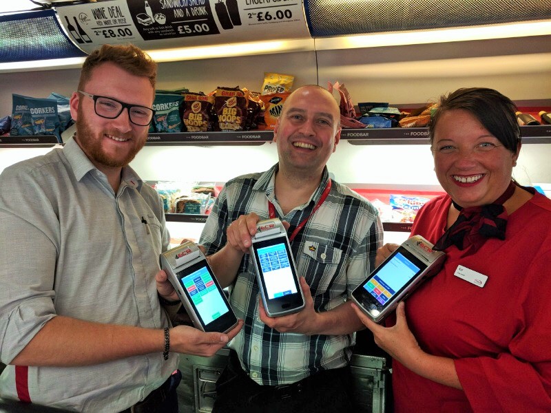 new epos 2 solution from ECR three people holding the devices